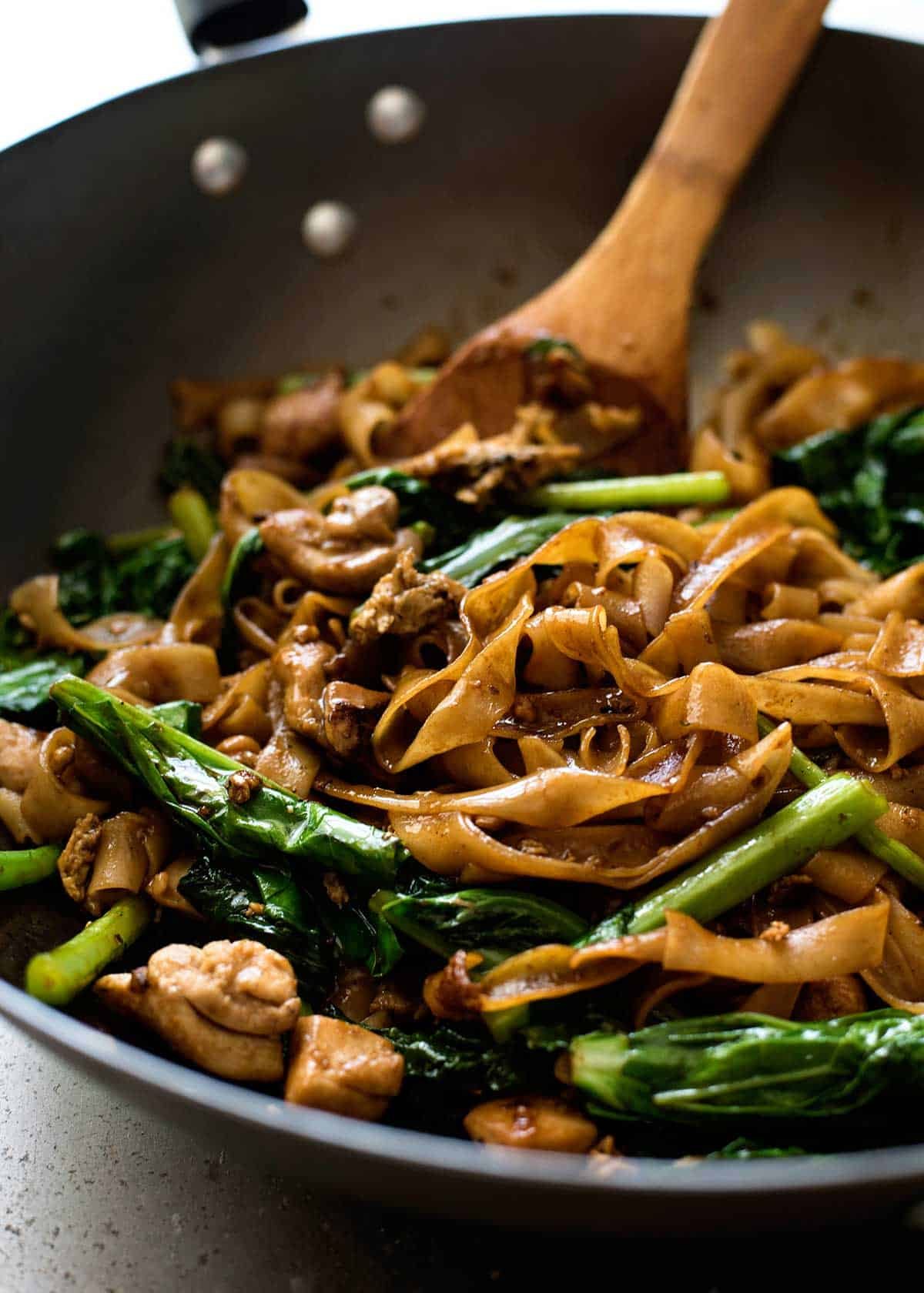 Pad See Ew in a wok, fresh off the stove