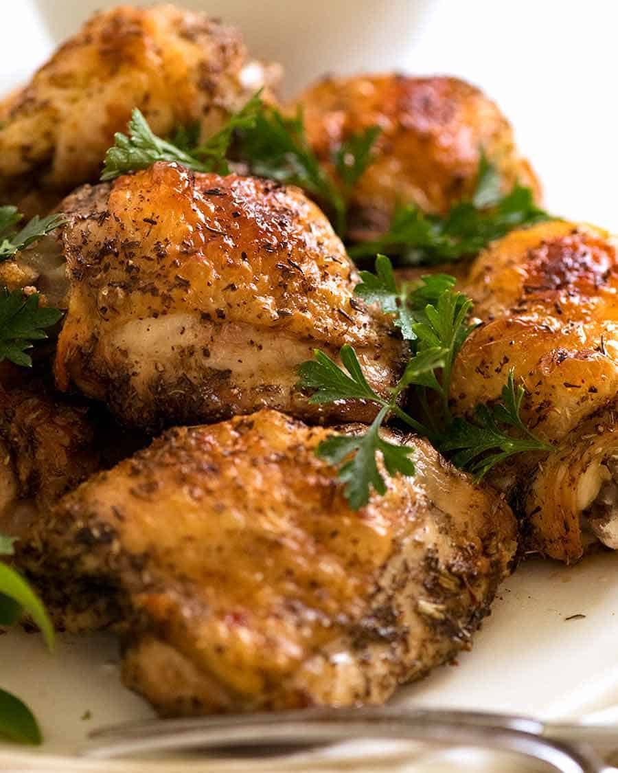Photo of a pile of crispy baked chicken thighs
