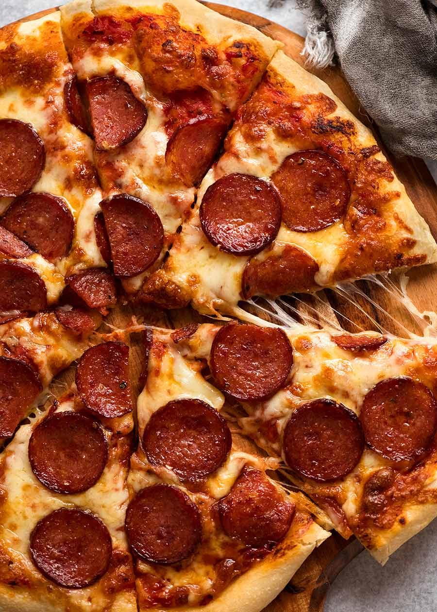 Overhead photo of homemade pizza dough recipe - pepperoni pizza